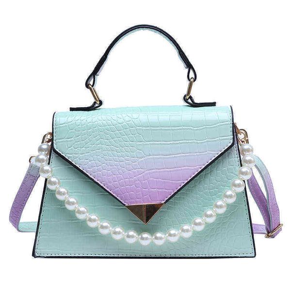 2021 summer pearl chain portable small square bag two piece fashion one shoulder messenger bag
2021 summer pearl chain portable small square bag two piece fashion one shoulder messenger bag