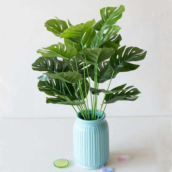 18heads artificial green monstera branch home garden bedroom balcony ornament fake plants christmas halloween party supplies
18heads artificial green monstera branch home garden bedroom balcony ornament fake plants christmas halloween party supplies