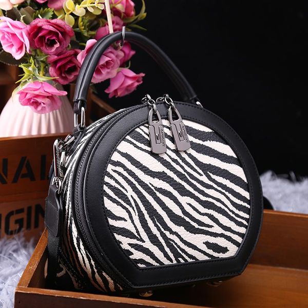 evening bags genuine leather 2021 fashion zebra pattern all-match one-shoulder messenger round bag for women purses and handbags sac
evening bags genuine leather 2021 fashion zebra pattern all-match one-shoulder messenger round bag for women purses and handbags sac