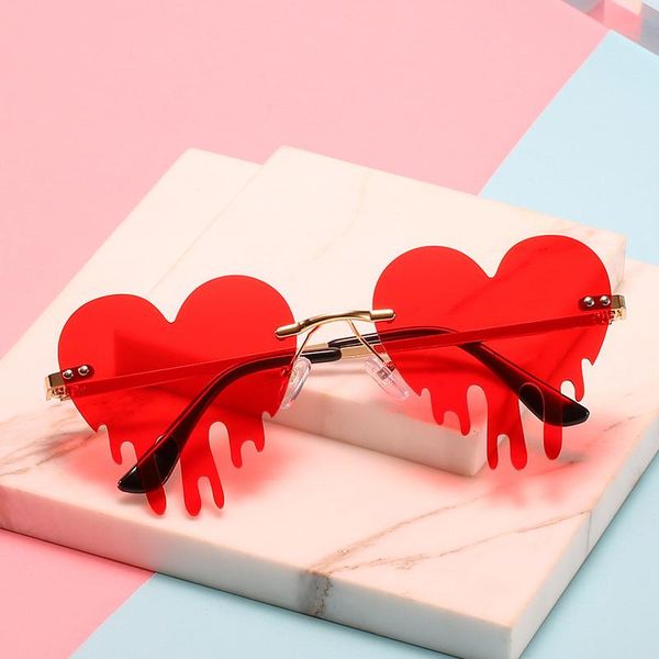 dripping heart sunglasses for women vintage fashion unique rimless glasses trendy uv400 outdoor sun glasses, White;black 
dripping heart sunglasses for women vintage fashion unique rimless glasses trendy uv400 outdoor sun glasses, White;black