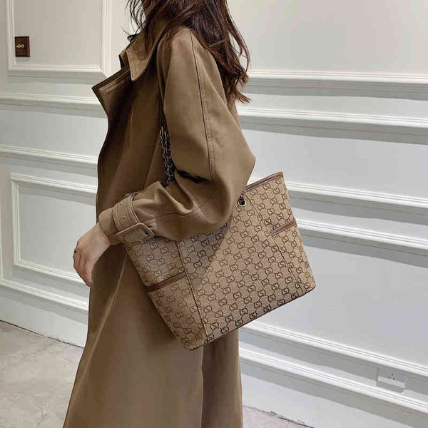 2022 factory outlet online korean popular capacity bag women's new printed tote bag chain single shoulder
2022 factory outlet online korean popular capacity bag women's new printed tote bag chain single shoulder