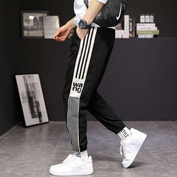 cropped slim little feet 2021 casual men's fashion brand striped sports pants, Black
cropped slim little feet 2021 casual men's fashion brand striped sports pants, Black