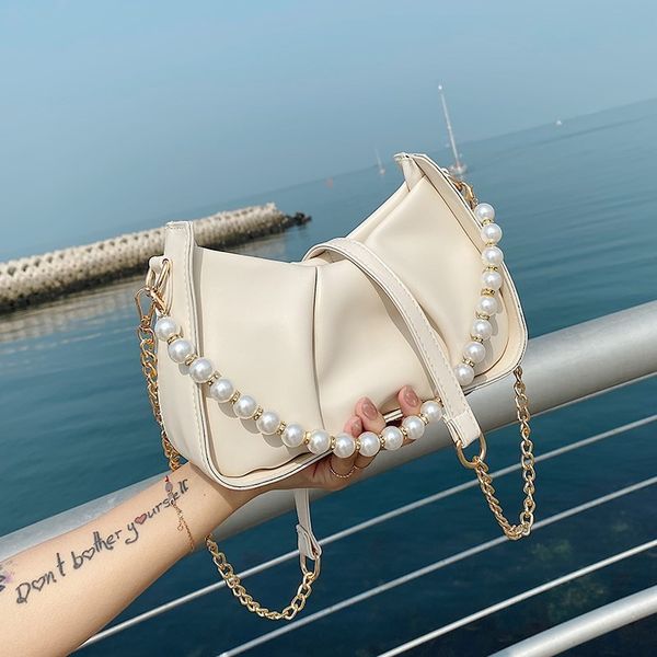 pleated underarm 2021 new fashion women's temperament chain shoulder solid texture simple pearl bag
pleated underarm 2021 new fashion women's temperament chain shoulder solid texture simple pearl bag