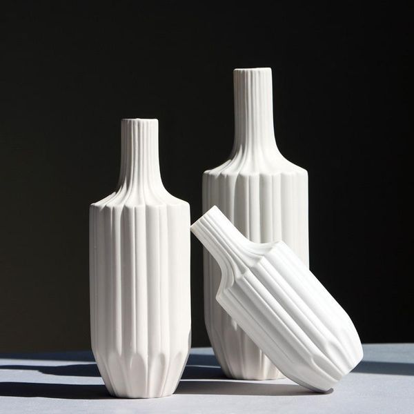 vases donglin european simple white porcelain ceramic flower vase home decoration accessories
vases donglin european simple white porcelain ceramic flower vase home decoration accessories