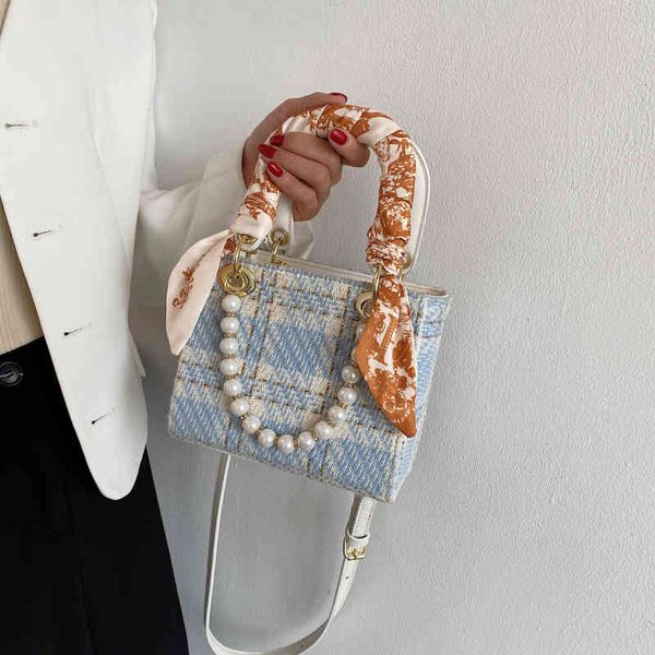women's 2021 new trend canvas personalized diana bag pearl contrast color portable single shoulder messenger
women's 2021 new trend canvas personalized diana bag pearl contrast color portable single shoulder messenger