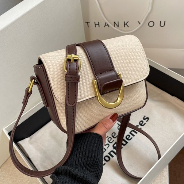small female 2022 autumn and winter new fashion contrast color small square bag korean single shoulder messenger bag 
small female 2022 autumn and winter new fashion contrast color small square bag korean single shoulder messenger bag