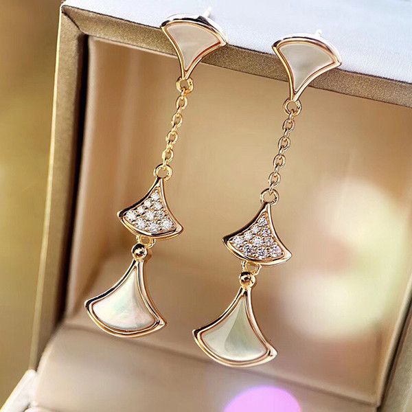 charms earrings baojia small fan 925 sterling silver plated 18k rose gold long skirt fan-shaped white fritillary with diamond, Golden
charms earrings baojia small fan 925 sterling silver plated 18k rose gold long skirt fan-shaped white fritillary with diamond, Golden