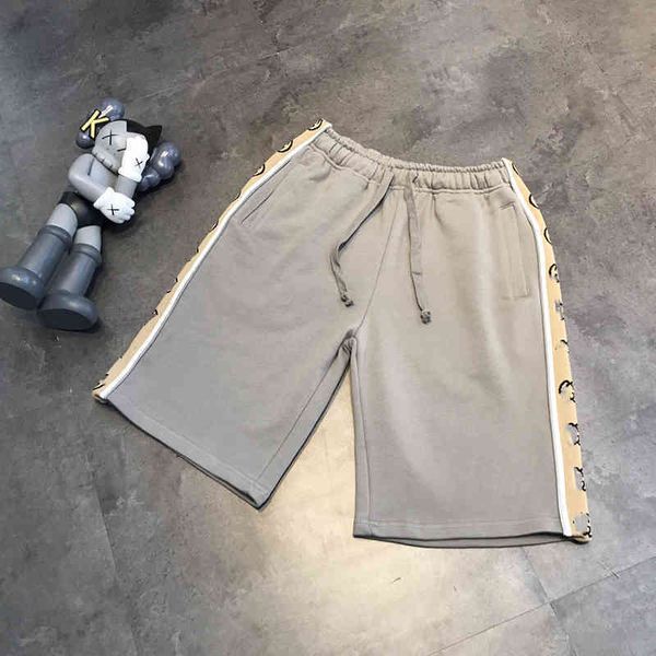 2022 factory wholesale new couple short sleeve g family gray 3m reflective string label ribbon drawstring pocket men's and women's, Black
2022 factory wholesale new couple short sleeve g family gray 3m reflective string label ribbon drawstring pocket men's and women's, Black