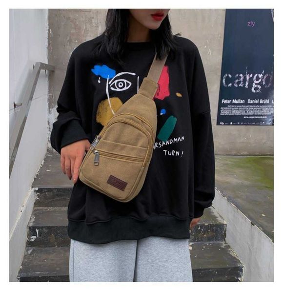 canvas and straddle outdoor leisure women's chest autumn new men's bag 
canvas and straddle outdoor leisure women's chest autumn new men's bag