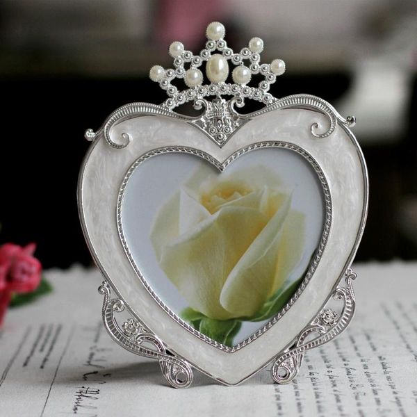 frames shiny silver plated heart shaped crown design white with pearls jeweled 5x5 inches tablemetal alloy picture po frame
frames shiny silver plated heart shaped crown design white with pearls jeweled 5x5 inches tablemetal alloy picture po frame