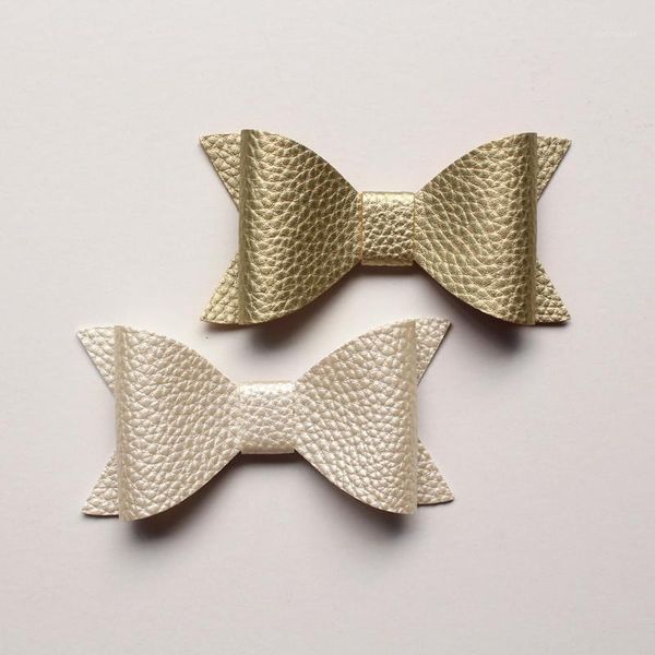 hair accessories 20pcs pu leather felt bow girl clip faux synthetic litchi stria texure grip gold barrette1, Slivery;white
hair accessories 20pcs pu leather felt bow girl clip faux synthetic litchi stria texure grip gold barrette1, Slivery;white