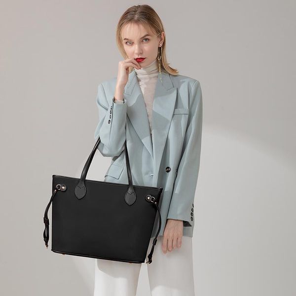 new autumn/winter black/khaki classic retretro commuter large volume tote bag fashion simple oxford casual one-shoulder mom bag
new autumn/winter black/khaki classic retretro commuter large volume tote bag fashion simple oxford casual one-shoulder mom bag