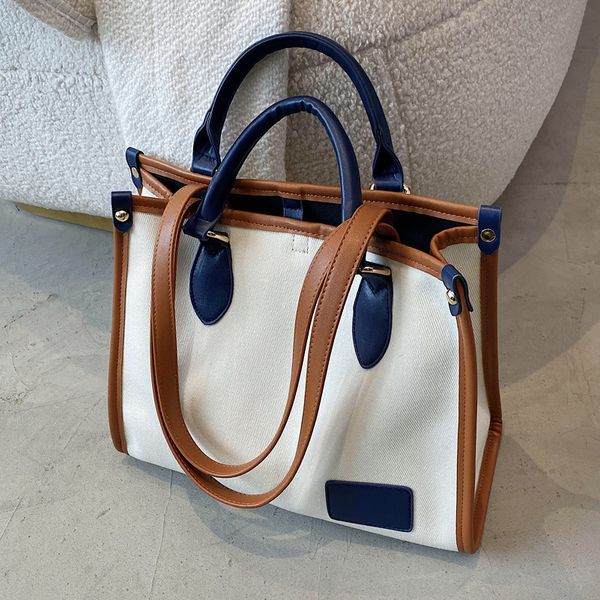 luxury handbags 2021 new women's large capacity versatile canvas single shoulder bag splicing foreign style portable tote bag
luxury handbags 2021 new women's large capacity versatile canvas single shoulder bag splicing foreign style portable tote bag