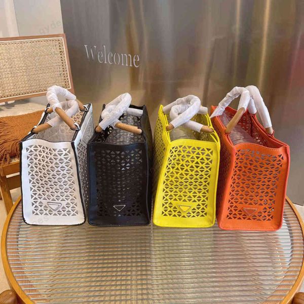 designer women's summer vacation series four-color hollow tote handbag size 30*16*25cm
designer women's summer vacation series four-color hollow tote handbag size 30*16*25cm