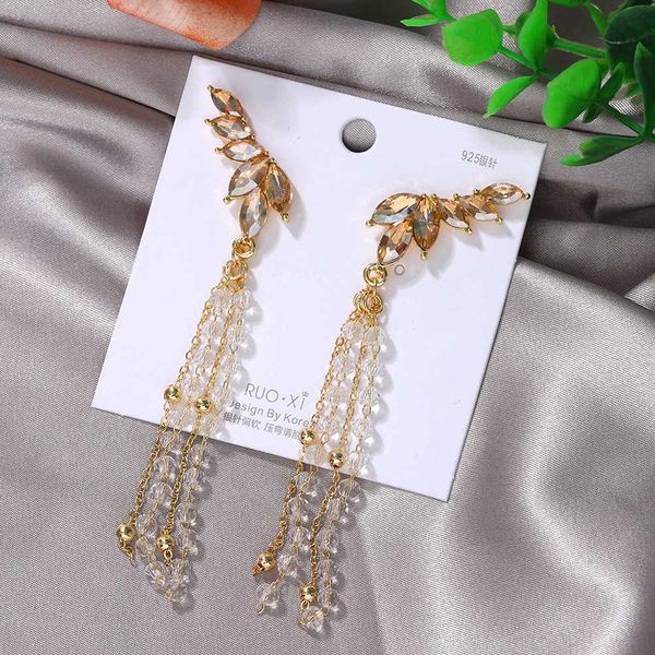 korean 925 silver needle fashion wing tassel new style temperament exquisite diamond beaded earrings
korean 925 silver needle fashion wing tassel new style temperament exquisite diamond beaded earrings