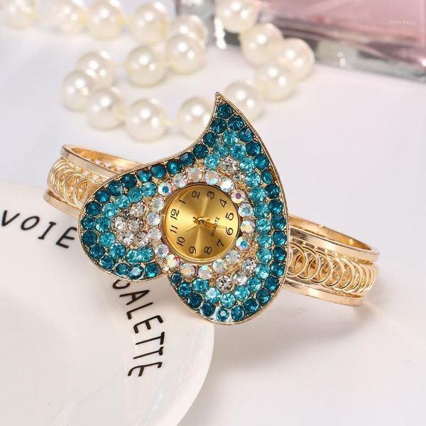 luxury women's bracelet watches gold ladies dress quartz wristwatches relogio feminino heart-shaped blue crystal, Slivery;brown
luxury women's bracelet watches gold ladies dress quartz wristwatches relogio feminino heart-shaped blue crystal, Slivery;brown