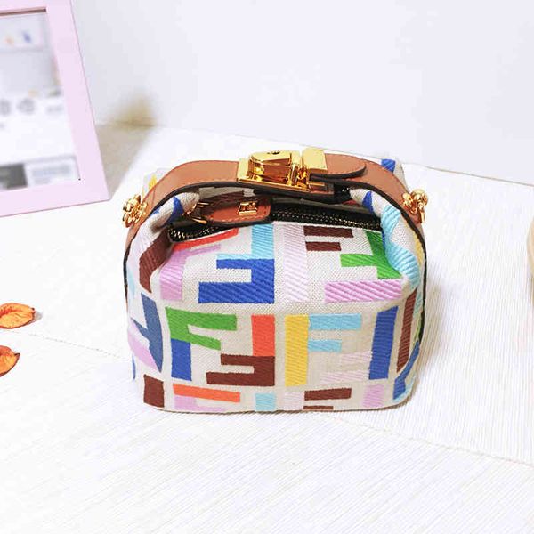 spring and summer women's lunch box make-up seven color candy canvas cowhide pillow one shoulder straddle handbag
spring and summer women's lunch box make-up seven color candy canvas cowhide pillow one shoulder straddle handbag