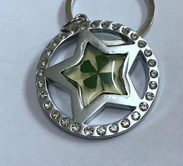 30 pcs real sweet style four leaf clover round white stone keychain vogue jewelry, Slivery;golden
30 pcs real sweet style four leaf clover round white stone keychain vogue jewelry, Slivery;golden
