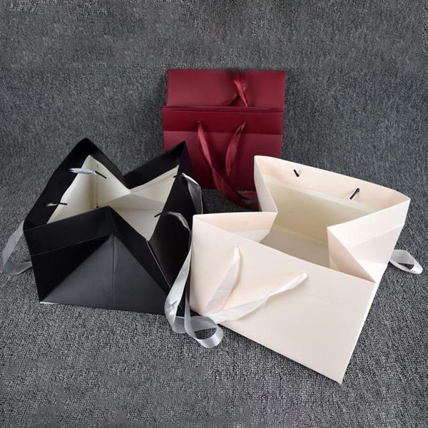 gift wrap festival large paper bag cake portable diy bouquet flower multifunction recyclable with handles 5pcs/lot
gift wrap festival large paper bag cake portable diy bouquet flower multifunction recyclable with handles 5pcs/lot