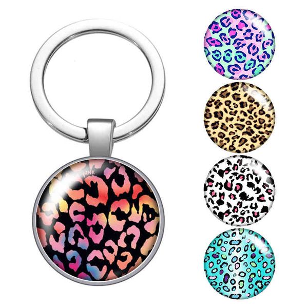 leopard snake patterns fashion glass cabochon keychain bag car key chain ring holder silver color keychains for men women gifts 
leopard snake patterns fashion glass cabochon keychain bag car key chain ring holder silver color keychains for men women gifts