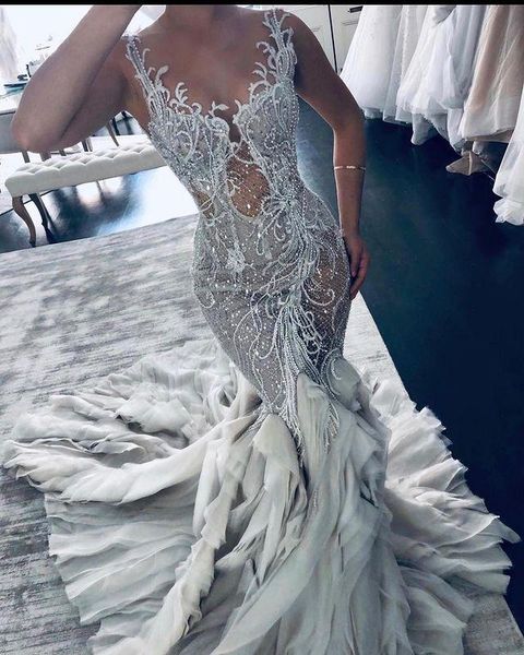 luxury lace beading wedding dresses bride gowns 2021 tiered skirts african appliqued crystal nigerian sheer v neck vestido de novia, White
luxury lace beading wedding dresses bride gowns 2021 tiered skirts african appliqued crystal nigerian sheer v neck vestido de novia, White