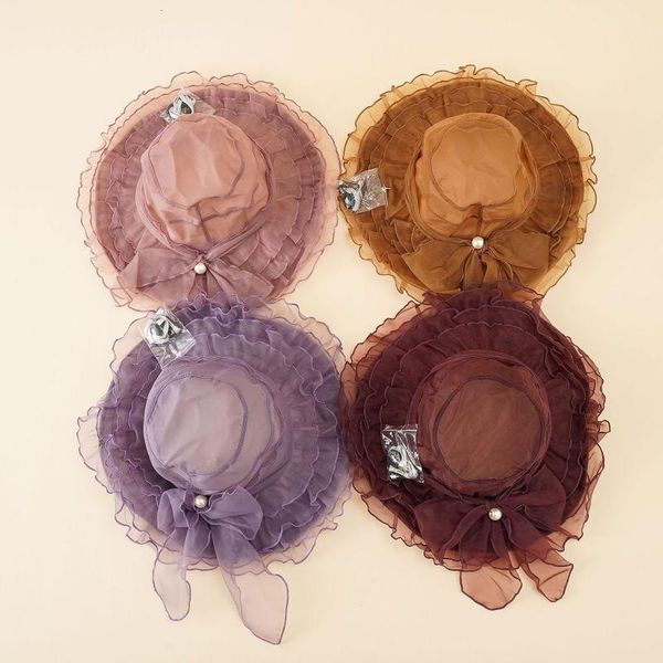 wide brim hats net gauze sunshade ruffled large brimmed hat with pearl buckle french bow beach cap solid color light translucent sun, Blue;gray
wide brim hats net gauze sunshade ruffled large brimmed hat with pearl buckle french bow beach cap solid color light translucent sun, Blue;gray