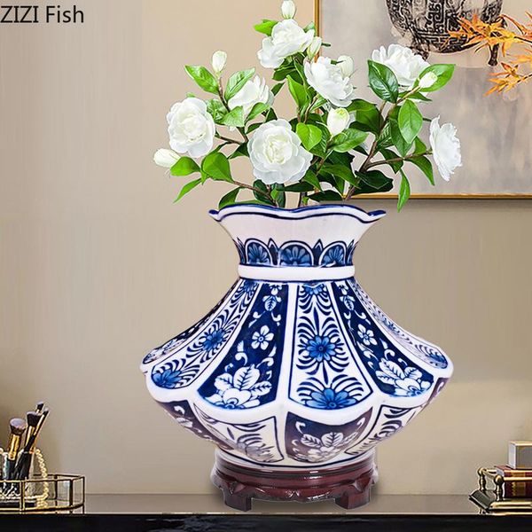vases creative blue and white ceramic vase large-caliber flower arrangement arts crafts bookcase deskdecoration storage tank 
vases creative blue and white ceramic vase large-caliber flower arrangement arts crafts bookcase deskdecoration storage tank