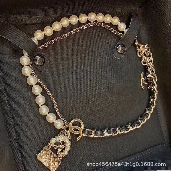 new bag wearing leather female pearl double-layer braided brass tassel small fragrance necklace neck chain, Silver
new bag wearing leather female pearl double-layer braided brass tassel small fragrance necklace neck chain, Silver