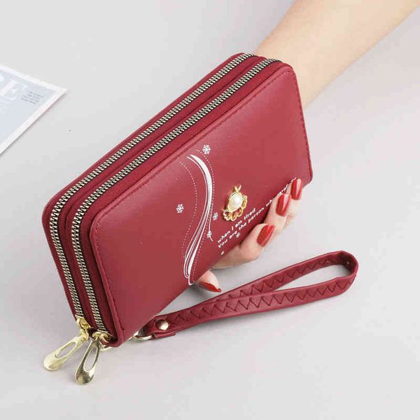 wallet women's long double zipper super large capacity wrist handbag card change mobile phone, Red;black
wallet women's long double zipper super large capacity wrist handbag card change mobile phone, Red;black