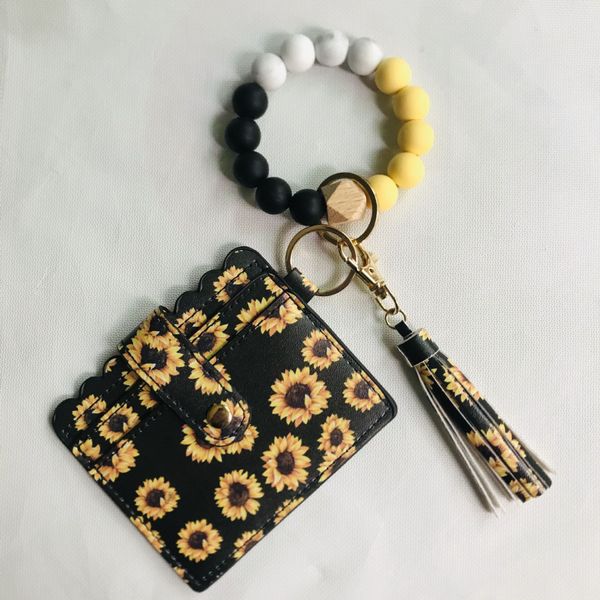 new edible silicon beads bracelet keychain sunflower tassel bracelet keychain coin purse, Silver
new edible silicon beads bracelet keychain sunflower tassel bracelet keychain coin purse, Silver