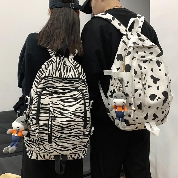 ladies zebra cow pattern canvas backpack men women couple school backpacks for teens female harajuku college shoulder bag
ladies zebra cow pattern canvas backpack men women couple school backpacks for teens female harajuku college shoulder bag