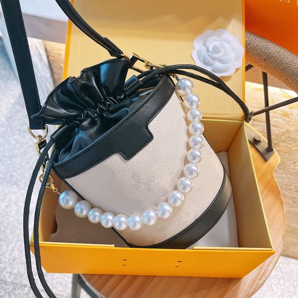 luxury pearl bucket bag brand in the long street shoulders with makings ultra-size 15 cm wholesale handbags
luxury pearl bucket bag brand in the long street shoulders with makings ultra-size 15 cm wholesale handbags