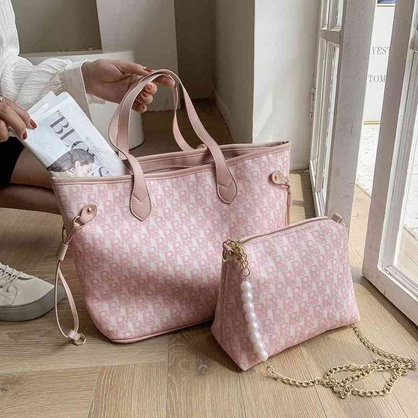 design large capacity new child mother single shoulder simple fashion women's large bag commuter tote bag handbags
design large capacity new child mother single shoulder simple fashion women's large bag commuter tote bag handbags