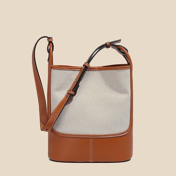xiaoyoujia color matching canvas bucket high-capacity messenger female xia xiaozhong design single shoulder bag
xiaoyoujia color matching canvas bucket high-capacity messenger female xia xiaozhong design single shoulder bag