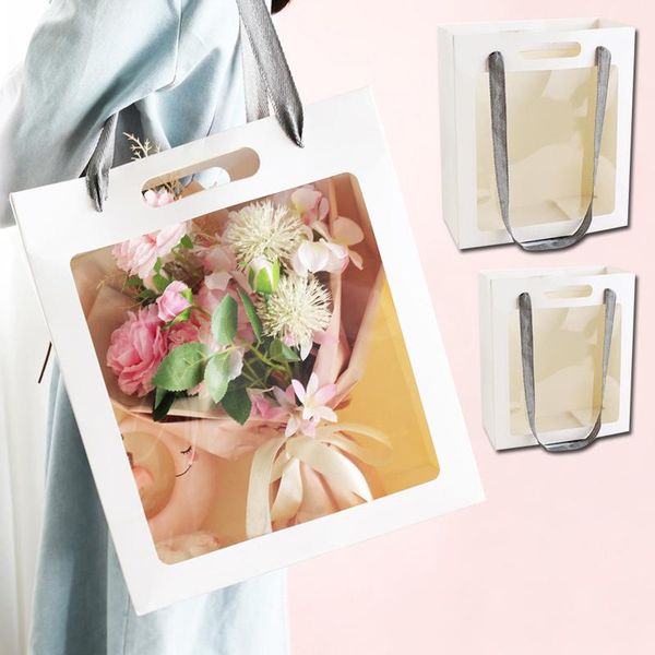 gift wrap flower packaging bag with transparent window valentine's day tote doll hand open paper
gift wrap flower packaging bag with transparent window valentine's day tote doll hand open paper