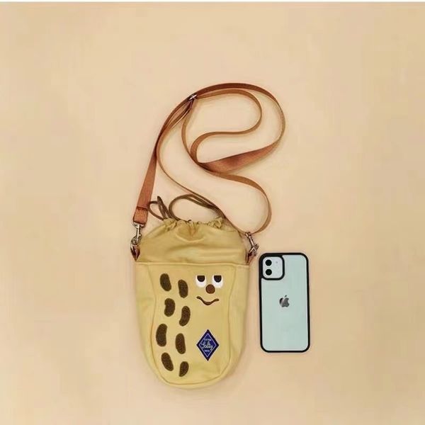 ins peanut shape canvas super cute mini mobile phone bag bundle mouth drawstring single shoulder messenger bag
ins peanut shape canvas super cute mini mobile phone bag bundle mouth drawstring single shoulder messenger bag