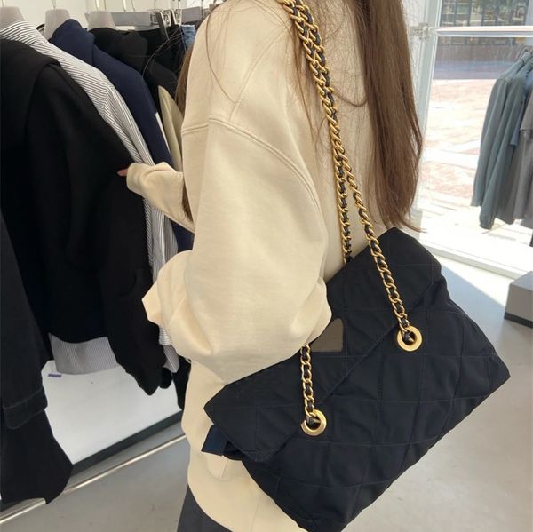 designer bags 2021 fashion nylon handbags women black gold chain shoulder bag classic navy blue handbag size 25cm
designer bags 2021 fashion nylon handbags women black gold chain shoulder bag classic navy blue handbag size 25cm