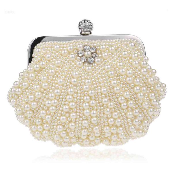 new fashion shell design women bags beaded handmade diamonds chan shoulder messenger crystal wedding evening bag
new fashion shell design women bags beaded handmade diamonds chan shoulder messenger crystal wedding evening bag