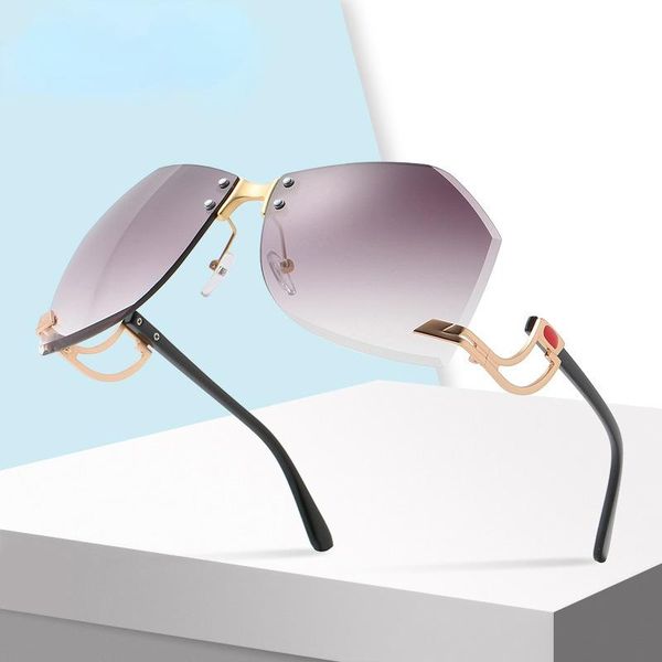 sunglasses female 2021 fashion rimless personality trend hollow temple irregular ocean lens, White;black
sunglasses female 2021 fashion rimless personality trend hollow temple irregular ocean lens, White;black
