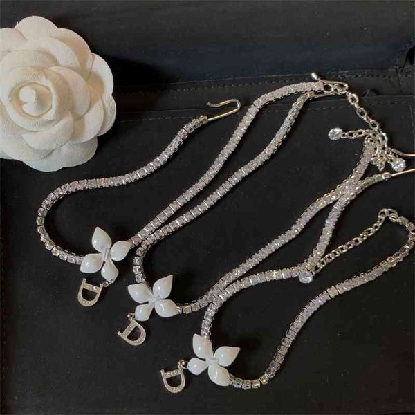 2021 new designer light luxury family small white flower zircon chain letter medieval series shining necklace earhook temperament earrings, Silver
2021 new designer light luxury family small white flower zircon chain letter medieval series shining necklace earhook temperament earrings, Silver