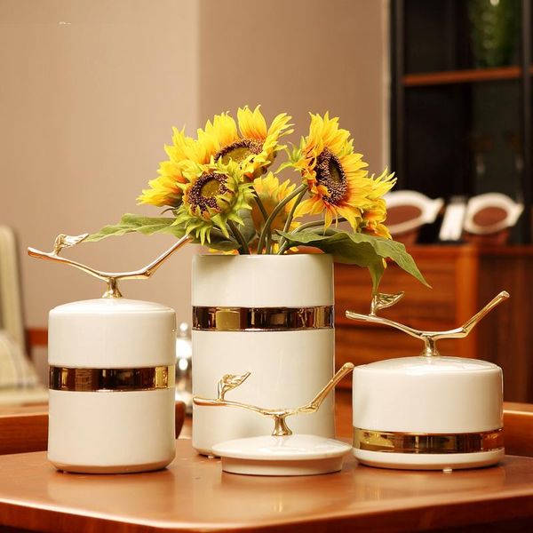 vases european ceramic gold-plated storage tank modern luxury living room flower decoration porcelain wedding gift
vases european ceramic gold-plated storage tank modern luxury living room flower decoration porcelain wedding gift