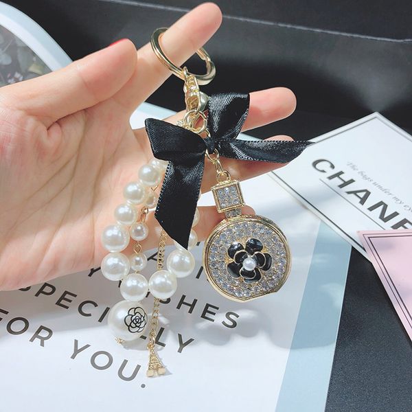 korean edition inlaid diamond water bottle key ring female pearl string bow bag accessories pendant fashion small commodity creativity, Silver
korean edition inlaid diamond water bottle key ring female pearl string bow bag accessories pendant fashion small commodity creativity, Silver