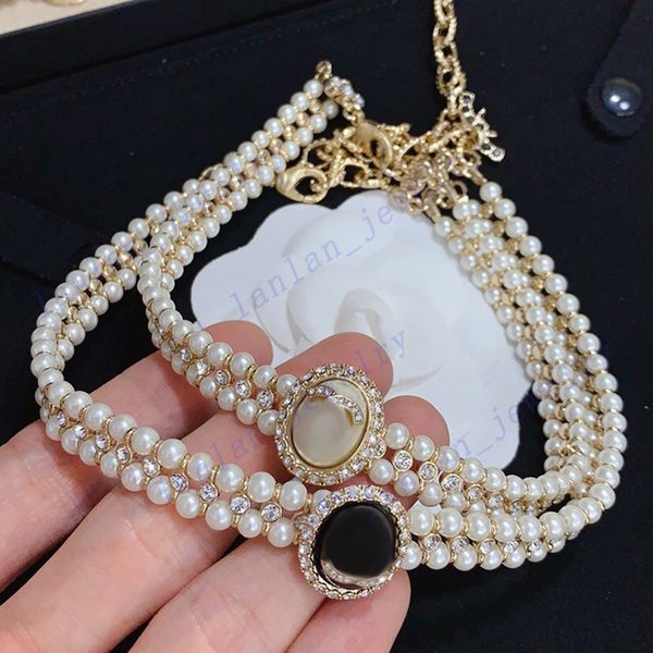 lh-c12 designer necklaces pendants classic letter logo oval double pearl diamond necklace same bracelet black and white, Golden;silver
lh-c12 designer necklaces pendants classic letter logo oval double pearl diamond necklace same bracelet black and white, Golden;silver