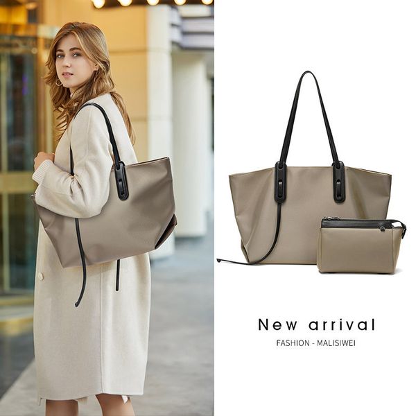 bag women 2021 new fashion simple women's portable high-capacity oxford butot single shoulder bag
bag women 2021 new fashion simple women's portable high-capacity oxford butot single shoulder bag