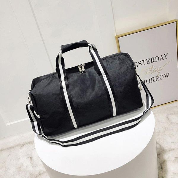 large capacity women's travel bag men's weekend trip duffle bags hand luggage shoulder crossbody female baggage handbag pack duffe
large capacity women's travel bag men's weekend trip duffle bags hand luggage shoulder crossbody female baggage handbag pack duffe