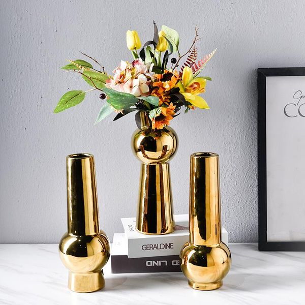creative geometric ceramic vase gold decoration accessories modern luxury small living room flower arrangement vases
creative geometric ceramic vase gold decoration accessories modern luxury small living room flower arrangement vases