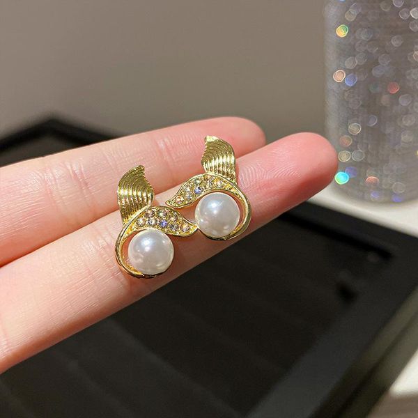luxury simulated pearl mermaid tail ear studs rhinestone whale fishtail stud earrings for women korean jewelry pendientes, Golden;silver
luxury simulated pearl mermaid tail ear studs rhinestone whale fishtail stud earrings for women korean jewelry pendientes, Golden;silver