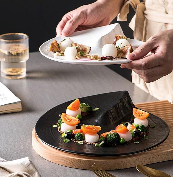 dishes & plates dining plate creative japanese style el western restaurant mood irregular round black ceramic dinner
dishes & plates dining plate creative japanese style el western restaurant mood irregular round black ceramic dinner