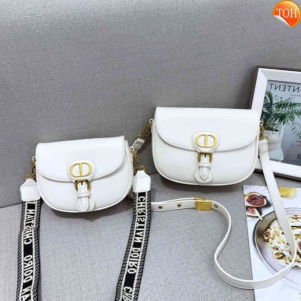 2021 new fashion women's bag half round cowhide crossbody single shoulder mini saddle wide strap
2021 new fashion women's bag half round cowhide crossbody single shoulder mini saddle wide strap