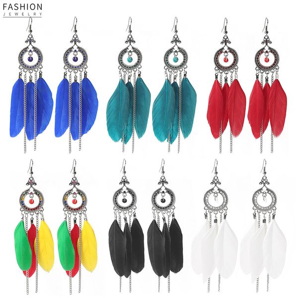 bohemian personality hollow out geometric color feather beach colorful rice beads earrings female, Silver
bohemian personality hollow out geometric color feather beach colorful rice beads earrings female, Silver